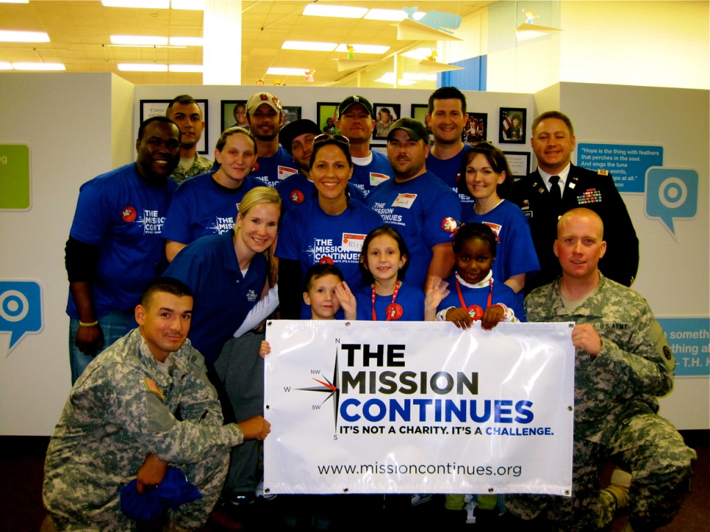 Veterans and supporters with The Mission Continues, the nonprofit founded by Eric Greitens, pose after a service project in Norfolk, Va. Photo: Emily Rodenbeck / Wikimedia